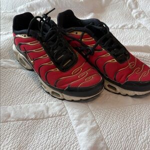 Nike Red and Black Athletic Shoes with Gold Details
